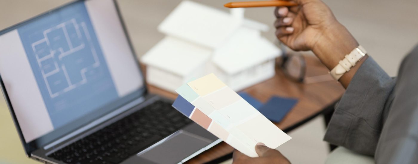 side-view-woman-making-plans-redecorate-home-with-laptop
